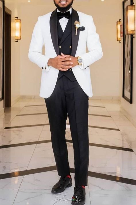 This is a White on black tuxedo suit which, perfect for any man's wedding style. A suit like this could be worn as a groom's wedding outfit or any night event for dapper men. If you would like a suit like this custom made for you, book an appointment online with us at Giorgenti New York! White Black Tuxedo Wedding, Black And White Tuxedo For Men Wedding, Wedding Suits Men White And Black, Black And White Wedding Tuxedo, Black And White Suit For Men Wedding, Stylish Groom Suit, White And Black Wedding Suit, Black And White Prom Suit, White And Black Tuxedo Wedding