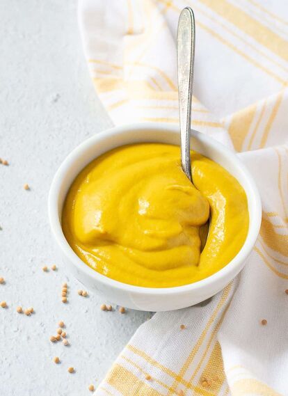 This homemade mustard recipe is surprisingly easy to make with a few simple pantry ingredients! Making prepared yellow mustard is much more flavorful than the squeeze bottle storebought variety. It's guaranteed, that your friends and family will love its flavor and be asking, "Where did you get this great-tasting mustard sauce?" If you have never made homemade mustard now is the time to try. Making gourmet mustard at home is much easier than it sounds and it will keep up to a year in… Deserturi Raw Vegan, Mustard Pretzels, Homemade Mustard, Mustard Recipe, Vegan Fish, Homemade Condiments, Dry Mustard, Chicken Salad Recipes, Salad Dressing Recipes