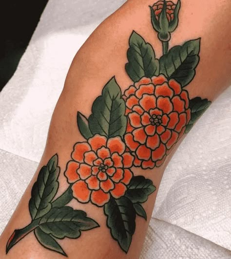 Marigold Neotraditional, Marigold Elbow Tattoo, Neo Traditional Marigold Tattoo, Marigold Flower Tattoo Traditional, Marigold Flower Tattoo Color, American Traditional Marigold Tattoo, Marigold Tattoo Traditional, Marigold Traditional Tattoo, Traditional Marigold Tattoo