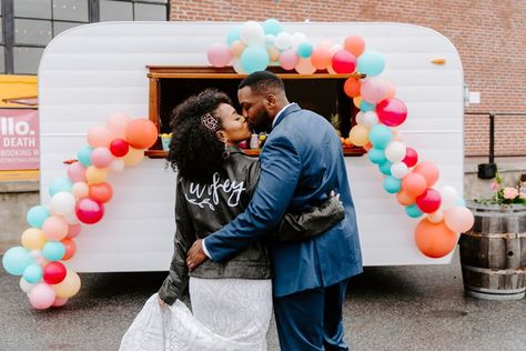 Bride and groom in front of a white van trailer lined with a colorful balloon arch Maryland Wedding Favors, Baltimore Wedding Venues, Wedding Venue Maryland, Eastern Shore Maryland Wedding Venues, Eastern Shore Maryland Wedding, Eastern Shore Wedding, Wedding Venues Pennsylvania, Maryland Wedding Venues, Industrial Wedding Venues