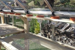 Greenhouse Growing Bench : 12 Steps (with Pictures) - Instructables Diy Greenhouse Shelves, Greenhouse Tables, Greenhouse Shelves, Greenhouse Benches, Garden Shed Interiors, Diy Greenhouse Plans, Outdoor Greenhouse, Build A Greenhouse, Greenhouse Interiors