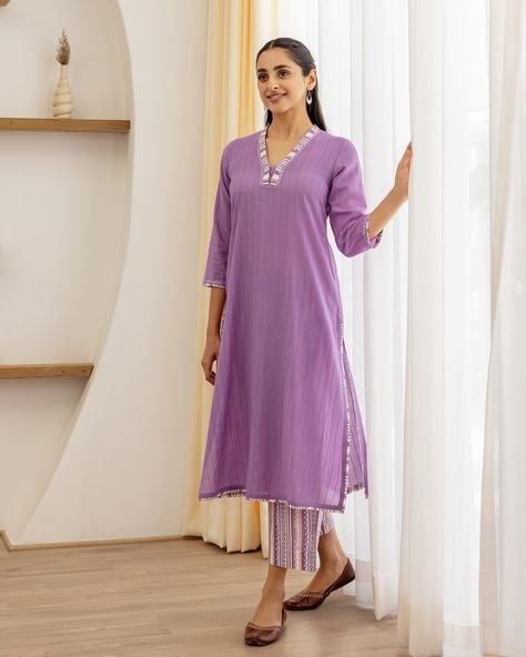 Summer 2024 - New arrivals! With a subtle striped detailing, our Lilac Dobby Kurta has a contemporary flair. Crafted in a cool lilac dobby, this lively-looking kurta is embroidered with trims of patterned stripes and highlighted with gudri and sequin work. [ Cottons Jaipur, Cotton, Lavender, Paisley, Handmade Kurtas, Everyday-wear, Summer staples ] #cottons #cottonsjaipur #newarrivals #floral #summer #summer2024 #handcraftedkurtas #comfortfits #cottonsuitset #summertime #summerstaples #la... Wardrobe Manifestation, Cottons Jaipur, Cotton Lavender, Ethenic Wear, Elegant Dresses Classy, Designer Dresses Casual, Dresses Classy, Fashion Attire, Summer Staples