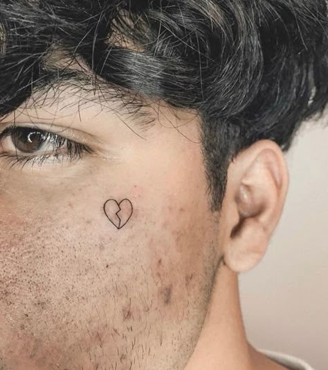 Face tattoos are unquestionably for courageous people since they are one of the most contentious styles of body art. Heart Tattoo On Face, Cool Face Tattoos, Heart Face Tattoo, Under Eye Tattoo, Tattoo On Face, Brooklyn Williamsburg, Black Heart Tattoos, Emo Tattoos, Red Heart Tattoos