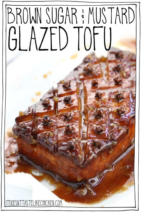 Brown Sugar & Mustard Glazed Tofu! Just 10 ingredients and easy to make. Inspired by glazed ham this tofu roast is the perfect centrepiece for Easter dinner or a holiday feast. #itdoesnttastelikechicken #veganrecipes #easterrecipe Tofu Roast, Tofu Meals, Vegan Ham, Glazed Tofu, Vegan Easter, Vegan Meat, Glazed Ham, Vegan Tofu, Like Chicken