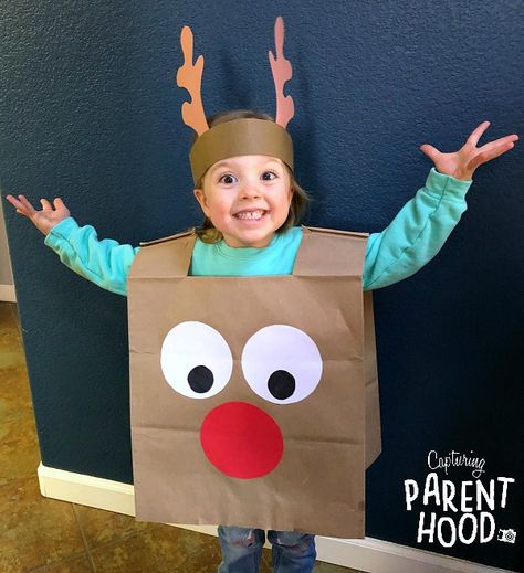 Paper Bag Reindeer Craft • Capturing Parenthood Diy Reindeer Costume, Marbled Christmas Ornaments, Diy Christmas Costumes, Sensory Bottle, Reindeer Costume, Hanging Craft Ideas, Rainbow Water, Paper Bag Crafts, Reindeer Craft