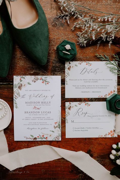 Elegant Winter Wedding Detail Flatlay Shots | Winter wedding detail flat lay of a beautifully coordinated wedding invitation suite set against a rustic wooden backdrop. The suite includes an invitation, details card, and RSVP card. Showcases emerald green winter wedding colors and details. Book Grace to capture your NYC wedding or destination wedding at ellenbergco.com! Winter Wedding Flat Lay, Emerald Green Winter Wedding, Green Winter Wedding, Invitation Details Card, Upstate New York Wedding, Wooden Backdrop, New York Wedding Venues, Wooden Backdrops, Elegant Winter Wedding