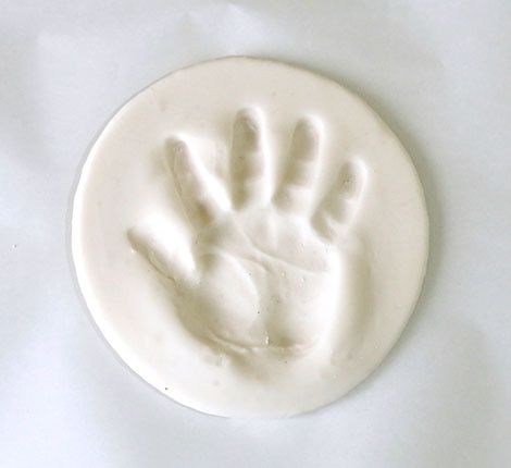 Keepsake Craft: Baking Soda Clay Handprint Ornaments | Play | CBC Parents Christmas Ornaments Handprint, Baking Soda Clay, Clay Handprint, Handprint Ornaments, Keepsake Crafts, Homemade Clay, Baking With Kids, Clay Food, Clay Ornaments