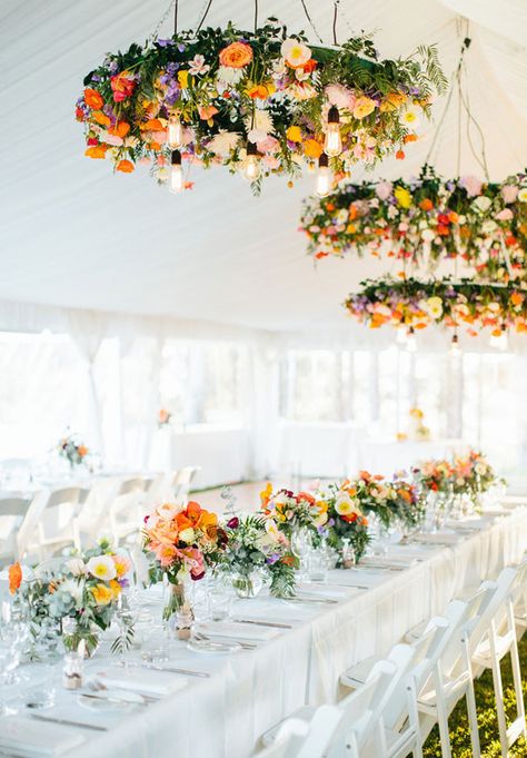 Moving onto floral chandeliers! Have you ever seen anything so lush and colorful? | 19 Insanely Gorgeous Wedding Flowers That'll Get You Hard Flowers Hanging, Wedding Reception Flowers, Flower Chandelier, Floral Chandelier, Spring Wedding Flowers, Wedding Table Flowers, Reception Flowers, Summer Wedding Colors, Wedding Wreaths