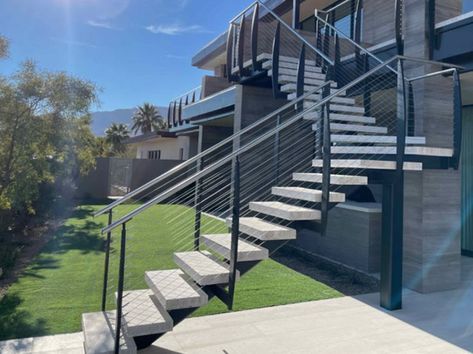 Exterior floating stair with mono stringer and landings with travertine treads Concrete Stair Treads Outdoor, Exterior Floating Stairs, Floating Outdoor Stairs, Concrete Stair Railing Outdoor, Stair Balustrade Ideas, Floating Stairs Outdoor, Exterior Concrete Stairs, Exterior Stairs Design, Outdoor Stairs Ideas