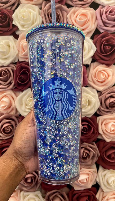 Starbucks Blue Evil Eye Rhinestone Filled Tumbler|Rhinestone Lid| Reverse Rhinestones|Lt. Sapphire AB New rhinestone filled tumblers! This tumbler is perfect for a bougie friend or yourself :) It shines to bright in the sun and gives off a very class look. This tumbler matches any aesthetic and is an amazing statement piece that all your friend will be talking about :) Hi there:) Starbucks is having a shortage of the 24 oz Acrylic tumblers but I have amazing Non Branded 24 oz tumblers that are t Starbucks Rhinestone Tumbler, Rhinestone Snowglobe Tumbler, Acrylic Tumbler Ideas, Filled Tumblers, Copo Starbucks, Starbucks Cup Design, Starbucks Cup Art, Starbucks Design, Bling Bottles