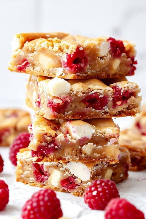 Raspberry and White Chocolate Blondies - Insanely Good Raspberry Blondies, White Chocolate Desserts, Raspberry And White Chocolate, Chocolate Blondies, White Chocolate Blondies, Desserts Bars, Blondie Bar, Raspberry Desserts, Pure Cocoa Butter