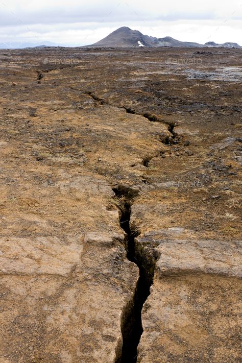 Chasm In The Earth, Iceland by IndustryAndTravel. Lots of cracks run through the Krafla area in Iceland which still shows a bit volcanic activity.#IndustryAndTravel, #Lots, #cracks, #Chasm Schism Art, Background Mountain, Dry Earth, Cracked Earth, Scorched Earth, Earth Illustration, Singing Monsters, Sedimentary Rocks, Run Through