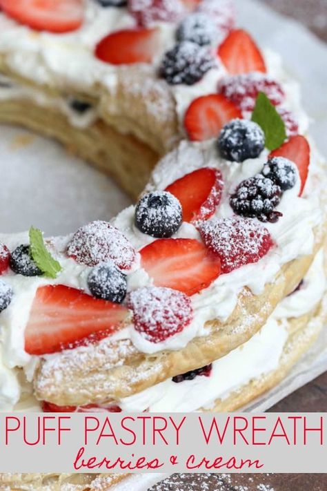 Puff Pastry Cake with a cream layer topped with berries. #dessert #puffpastry #berries #wreathcake #easyrecipe Pastry Wreath, Recipe For Puff Pastry, Recipe With Puff Pastry, Puff Pastry Cream, Puff Pastry Cake, Wreath Recipe, Puff Pastry Recipes Dessert, Puff Dessert, Pastries Recipes Dessert