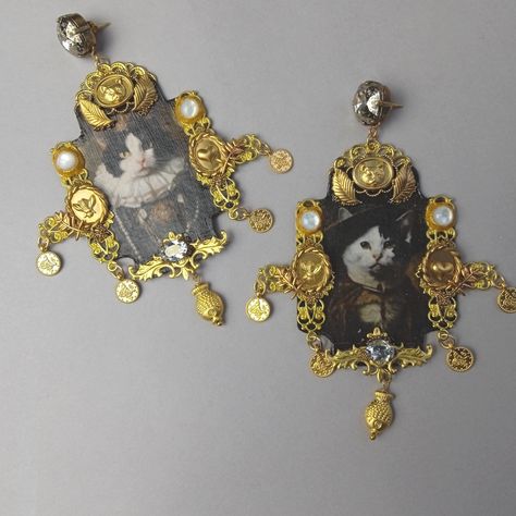 "Funny earrings of \"If Cat in Boots had been married\" in Baroque & Rococo style. The picture has been treated to look like an old painting. Vintage stampings, filigree, rhinestones & mother pearl cab. Unique and hilarious, just like me..." Cat In Boots, Rococo Jewelry, Funny Earrings, Style Baroque, Painting Vintage, Rococo Style, Old Paintings, Fabulous Jewelry, Mother Pearl