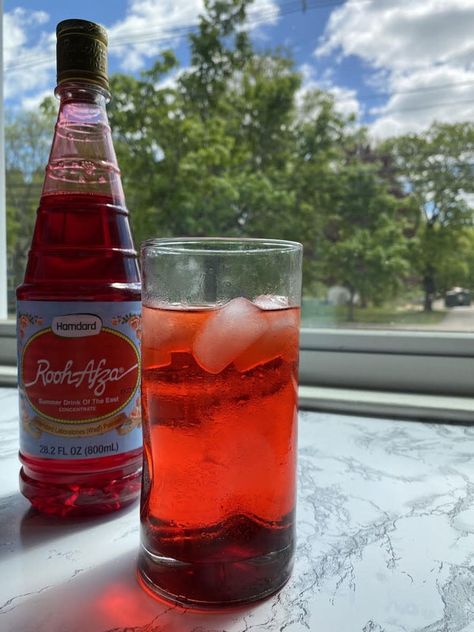 Using this Rooh Afza, a Rose infused syrup you can create so many simple, refreshing drinks to cool yourself off on those long summer days!!!! Rooh Afza, Sparkling Water, Refreshing Drinks, Summer Drinks, A Rose, Pistachio, Simple Way, Syrup, Summer Days