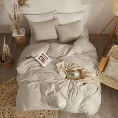 The simple style of the washed cotton duvet set, its material is soft and breathable, and the natural ruffled texture adds a retro atmosphere, providing you with a more relaxed and comfortable lifestyle. The washed cotton duvet set comes in a variety of colors and sizes to complement a variety of home decor styles. Size: Full Duvet Cover + 2 Standard Pillowcases, Color: Beige Tan | Ebern Designs Washed Cotton Duvet Cover Set Cotton in White | Full Duvet Cover + 2 Standard Pillowcases | Wayfair | Cream Sheets Aesthetic, Twin Bed Spread, Tan Bed Set, Western Duvet Covers, Simple Neutral Bedding, Cream Bedsheets Aesthetic, Cream Duvet Bedding Ideas, Retro Boho Home Decor, Beige Bedding Aesthetic