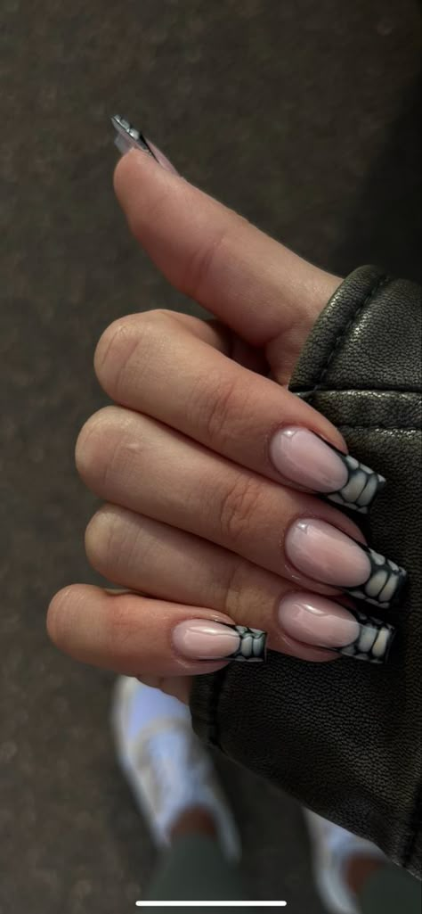 The french tip nail aka french manicure is getting a makeover in 2024. We got the latest viral nail designs that are trending all over tiktok and beyond. #nails #nail Follow us for the latest 2024 nail ideas and nail inspo! Black White Nails Designs Classy, Reptile French Tip Nails, Nails Inspiration Long Square, Classy Nails Winter, Black Croc Nails, Square Acrylic Nails Winter, Croc Nail Design, Square Winter Nails, Croc Nails