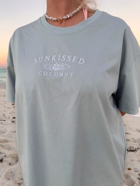 sunkissed glass blue shirt - Google Search Sunkissed Coconut Shirt, Cute Summer T-shirts, Cute T Shirts Aesthetic, Graphic Tees Preppy, Ocean Themed Clothes Aesthetic, Beachy Oversized Shirts, Summer Oversized Tee, Loose Summer Tops, Cute Graphic Shirts