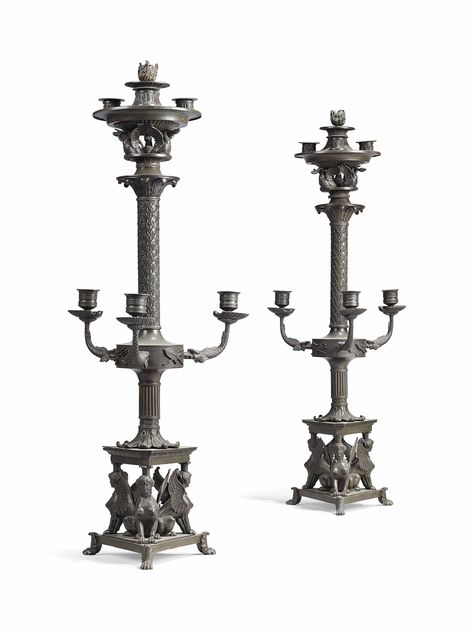 PAIR OF ITALIAN PATINATED-BRONZE SIX-LIGHT CANDELABRA CIRCA 1840 Each with baluster stem supporting three nozzles above seated swans and encircled by frieze with alternating crossed flags and tritons and raised-tail fish candle arms each balancing a shell surmounted by a nozzle 31 ¾ in. (80.5 cm.) high Copper Antiques, Chinese Candle, Fish Candle, Chinese Architecture, Candle Magic, Nozzles, Swans, Lamp Post, Copper