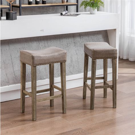 2x Wooden Legs Saddle Bar Stools Leather Padded Counter Chairs with studs 74.5cm Height Sturdy Frame Counter Stools：The Cambridge chair legs are made of solid natural rubberwood, which can bear up to 130kgs. The bar stools are also equipped with adjustable footpads, which keep the stool stand wit... Bar Stools For Kitchen, Farmhouse Island, Stools For Kitchen, Saddle Bar Stools, Island Chairs, Saddle Stools, Backless Stools, Leather Counter Stools, Backless Bar Stools