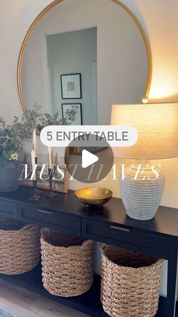 Tania Khan on Instagram: "5 ENTRY TABLE MUST HAVES 🤍 + Statement Lamp on either side of the table + Large Vase/Jug for floral stems - change for each season + Framed Canvas Wall Art - love landscape art 🖼️ + Wicker Baskets for lower shelf are great as a catch all + Large Mirror or Painting above your console I’ll link everything in this video in my highlights! Hope you have a wonderful weekend! 😍 #target #targethome #targetstyle #studiomcgee #studiomcgeetarget #homedecor #home #hobbylobby #amazonhome #amazon" Studio Mcgee Target, Entry Table Decor, Statement Lamp, Have A Wonderful Weekend, Table Large, Wonderful Weekend, Target Style, Large Baskets, Entry Table