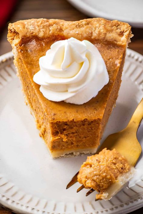 This outrageously good pumpkin pie is silky smooth, perfectly spiced, and so easy to make. Pumpkin Pie With Evaporated Milk, Libby's Famous Pumpkin Pie Recipe, Libby's Pumpkin Pie, Libbys Pumpkin Pie, Best Pumpkin Pie Recipe, Pumpkin Pie Recipe Easy, No Bake Pumpkin Pie, Best Pumpkin Pie, Easy Pumpkin Pie