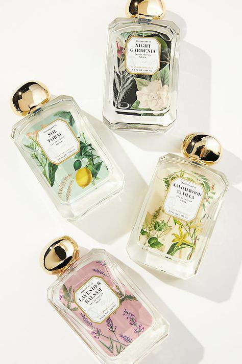 Expertly crafted in France, each *only-at-Anthro* eau de toilette is designed to evoke the *je ne sais quoi* lifestyle with every spritz. Balsam Woods (Woody): An entrancing blend of crisp pear, sophisticated spices, and rich cedarwood. Night Gardenia (Floral): A delicate breeze of fragrant gardenia and orange blossom swirling with clove and tuberose is enveloped within an unexpected warm musk base. Sandalwood Vanilla (Woody Gourmand): A silky and sweet blend with inviting florals, creamy vanill Floral Perfume Packaging, Perfume Product Design, Perfume Bottles Design, Luxury Apothecary, Perfume Packaging Design, Fragrance Packaging Design, Perfume Package, Perfume Branding, Floral Perfume Bottle