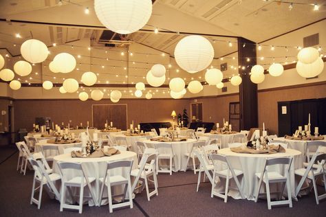 Reception Ceiling Idea Decorating with EXTREMELY high ceilings. Help! - The Knot Gym Reception, Reception Ceiling, Wedding Reception Entrance, Wedding Reception Hall, White Paper Lanterns, Ward Christmas Party, Hall Decorations, Reception Entrance, Low Budget Wedding