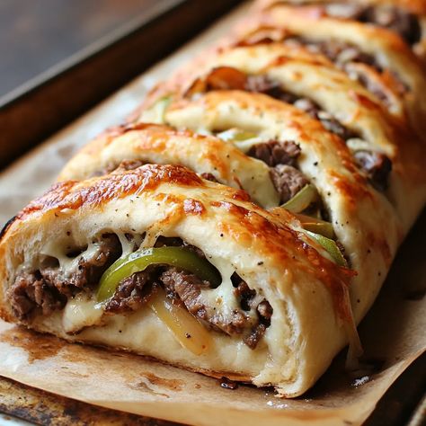 Philly Cheesesteak Stromboli Cheesesteak Sandwiches Philly, Philly Cheese Steak Braid, Stromboli Philly Cheesesteak, Philly Cheese Steak Pinwheels, Cheesesteak Stromboli Recipe Easy, Mozzarella Cheesesteak Stromboli, Philly Cheese Steak Puff Pastry, Recipes With Philly Steak Meat, Cheese Steak Stromboli Recipe