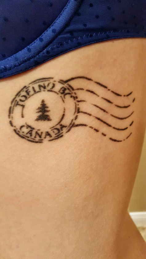 Postage stamp tattoo from Tofino Christian Tattoos For Men, Stamp Tattoo Ideas, Postage Stamp Tattoo, Upper Arm Tattoo, Globe Tattoos, Stamp Tattoo, Nature Tattoo, Travel Stamp, Valentine Photography