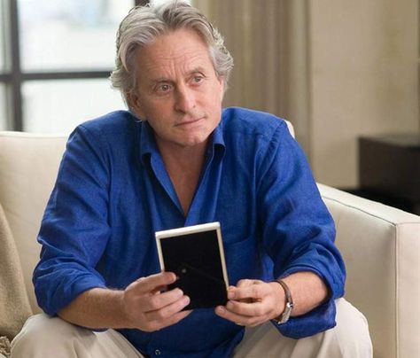 Michael Douglas playing Gordon Gecko in "Wallstreet: Money Never Sleeps" is wearings none other than a Jaeger-LeCoultre Reverso watch. Reverso Watch, Jaeger Lecoultre Reverso, Michael Douglas, Tank Watch, Jaeger Lecoultre, White Face, Tailored Suits, Gecko, Modern Man