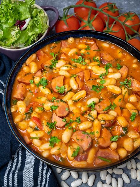 a plate of kielbasa bean stew Kielbasa Stew Recipes, Beans And Kielbasa Recipe, Kielbasa And Beans, Easy Stew Recipes, Kielbasa Soup, 15 Bean Soup, Sausage Stew, Kielbasa Recipes, Kielbasa Sausage