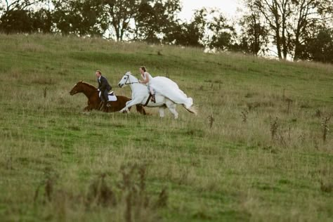 Bride and Groom galloping on Horses.  Gorgeous country wedding location near Sydney, NSW. http://www.chapmanvalleyhorseriding.com/australian-country-horseback-wedding/   White horse. Horseback wedding. Romantic wedding. Outdoor wedding. Unique wedding. Wedding Ideas. Horse Wedding Photos Beach, White Horse Engagement Photos, Bride Riding Horse, Wedding Entrance On Horse, Horses Wedding Photography, Wedding Ideas Horses, Horses At Weddings, Horse Riding Wedding, Weddings With Horses