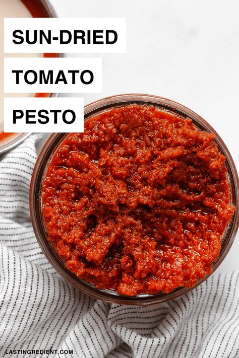 You don’t need basil for this sun-dried tomato pesto recipe. It's a pesto for every season made with one of the best pantry ingredients, jarred sun-dried tomatoes. Made in 5 minutes, this quick and easy sauce is full of flavor and color. You can stir it into pasta, slather it on pizza or whisk it into eggs or vinaigrette. Try this red pesto. You will love it. Sundried Tomato Pesto Recipe, Tomato Pesto Recipe, Sundried Tomato Pesto, Sun Dried Tomato Sauce, Red Pesto, Pantry Ingredients, Sundried Tomato, How To Make Pesto, Tomato Pesto