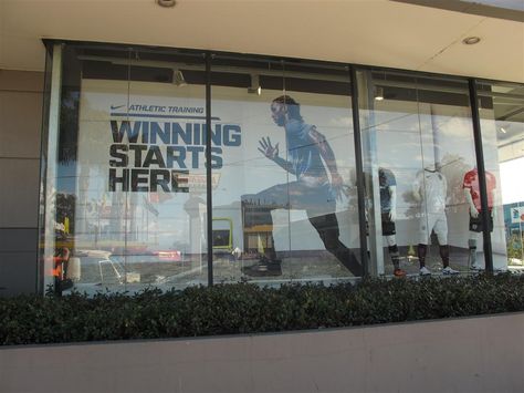 Nike Factory Store Athletic Training retail window display. Retail Window Display, Nike Factory Store, Massage Room Design, Nike Retail, Nike Factory, Store Window Displays, Gym Art, Retail Windows, Window Signs