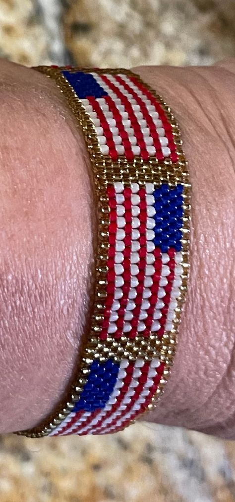 Hand beaded with a star closure. Shippinng cost is included. Each "flag" section takes about one hour to complete. Fits up to a 7" wrist ( I have made one for myself and I have a large wrist) Can be custom made to delete or add "flag" sections for size. Each additional flag is An additional $7.00. Add 21 days for custom made, please. (Can be sooner). 3 Color Beaded Bracelet, Loom Band Bracelets, Flag Beads, Chevron Friendship Bracelets, Blue Beaded Earrings, Seed Bead Crafts, Loom Bracelet Patterns, Bracelets Handmade Diy, Bead Charms Diy