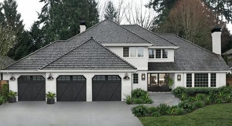 If you’re looking to integrate a black paint color in your home exterior makeover, we recommend considering Tricorn Black by Sherwin Williams. It’s a true black without strong undertones that works beautifully to add dimension to your curb appeal. We love it with crisp white or pearly gray foundation colors. #exteriordesign #curbappeal #paintcolors Alabaster And Tricorn Black Exterior, Sherwin Williams Exterior Paint, Sherwin Williams Exterior Paint Colors, Sherwin Williams Exterior, Tricorn Black, Exterior Color Palette, Shingle Roof, Home Paint Color, Entry Ideas