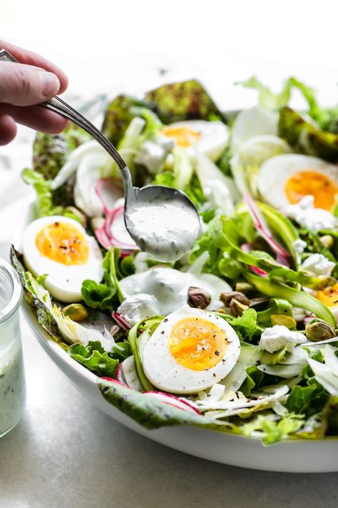 My Spring Salad with Eggs and Creamy Tarragon Dressing is a beautiful addition to any spring brunch or Easter table. It’s made with shaved asparagus, fennel, and radishes, crunchy pistachios, silky goat cheese, and jammy eggs. The dressing is to die for. #easy #recipe #healthy #eggs #spring #greens #lettuce #easter Tarragon Dressing, Salad With Eggs, Jammy Eggs, Shaved Asparagus, Super Salads, Chef Salad, Recipe Salad, Chicken Curry Salad, Red Onion Salad