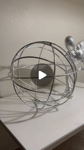 Brandon Lee on Instagram: "This sphere has been an absolute nightmare on my hands and fingers but I really love how it has turned out. I might decide to add another rings once I finish Atlas and see how it all looks together. What do you guys think? . . . #foilsculpture #aluminum #foil #art #artist #sculpture #sculpting #atlas #titan #giant #heaven #universe #cosmos #mythology #fantasy #explore #explorepage #fyp #fypシ #artreels #artprocess #artwork #artgallery #artistsoninstagram #artoftheday #arte #artofinstagram #craft" Aluminum Foil Sculpture, Atlas Sculpture, Artist Sculpture, Aluminum Foil Art, Sea Sculpture, Brandon Lee, Foil Art, Sculpture Park, Sculpture Painting