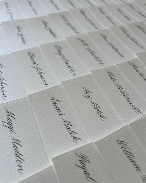 ✍🏾 Calligraphy Place Cards Just A Little Bit Different I know I post a ton of place card pictures and videos, but these ones are just a little bit different! For these, my client requested that first and last name be written on the same line for each place card. It was fun writing on a smaller scale, and I love the way they turned out! I think overall, the smaller calligraphy has a dainty and classy look. I’m thinking of adding this one-line style as an option in the Etsy shop; until then, ... Calligraphy Name Cards Wedding, Calligraphy Name Cards, Name Cards Wedding, Calligraphy Place Cards, Wedding Name Cards, Calligraphy Name, Wedding Name, Cool Writing, Place Card