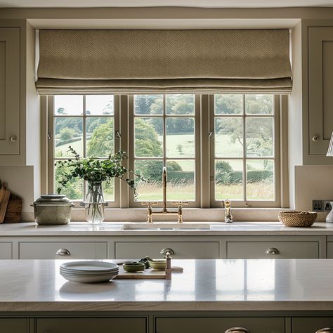 Don't neglect your kitchen windows - adding blinds can add some real personality and warmth.