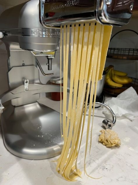 My Italian immigrant mother made homemade egg pasta by hand. I make mine with Kitchen Aid stand mixer and pasta attachments with less time and effort. Make this basic egg pasta with all-purpose flour, eggs, water and salt in a bout 30 minutes! Fresh homemade pasta is much easier than you think! It'a an Italian culinary delight! Your thirty minutes away from homemade pasta! Get this easy basic egg pasta recipe with step-by-step, making, drying and cooking instructions too. Click on the link! Pasta With Grape Tomatoes, Homemade Beefaroni Recipe, Kitchen Aid Pasta, Egg Pasta Recipe, Pasta By Hand, Beefaroni Recipe, Dopamine Diet, Kitchenaid Mixer Recipes, Best Spaghetti Sauce