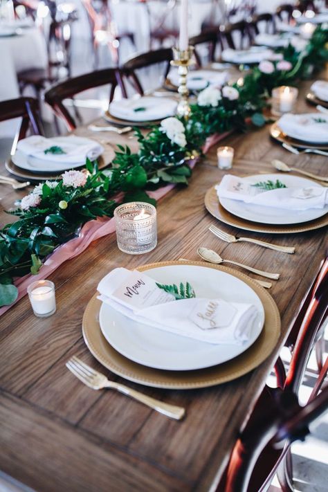 Blush and Gold table setting with peonies. For our table settings, we used gold chargers and gold flatware and accented with acrylic place cards. #wedding #weddingtable Gold Table Chargers, Greenery Wedding Tables, Highpointe Estate, Chargers Plates Table Setting, Gold Chargers Wedding, Diy Wedding Tables, Wedding Tables Ideas, Wedding Plate Setting, Wedding Table Place Settings