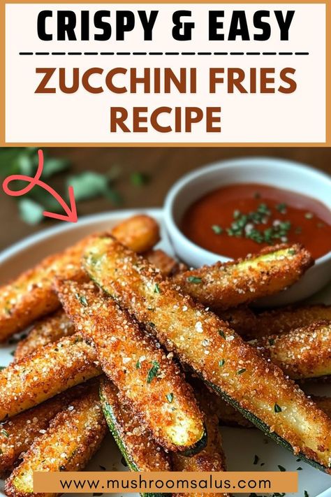 Close-up of crispy baked zucchini fries served on a plate with a side of marinara sauce, garnished with herbs. The zucchini fries are golden brown with a crunchy breaded coating, perfect for a healthy and easy snack. Easy Zucchini Fries, Keto Zucchini Fries, Crispy Zucchini Fries, Zucchini Fries Recipe, Risotto Recipes Easy, Crispy Zucchini, Nutritious Meal Plan, Crowd Pleasing Appetizers, Easy Zucchini