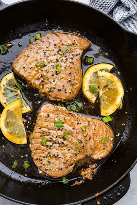 There's no reason to save Tuna Steaks for eating out, make them yourself for a gourmet restaurant experience in the comfort of your home. Not only are they full of healthy nutrients, they are delicious and a real treat any day of the week. Tuna Steaks Recipes Seared, How To Cook Yellowfin Tuna Steak, Keto Tuna Steak, Lemon Tuna Steak, Tun Steak Recipes, Seared Yellowfin Tuna Recipe, Bake Tuna Steak Oven, Tuna Ahi Steak Recipe, Tuna Steak In Oven