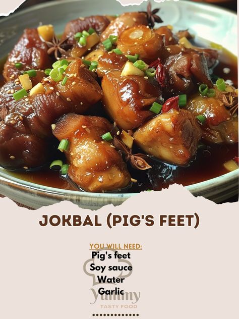 🐷 Indulge in Jokbal, a Korean delicacy! Tender pig's feet braised to perfection. 🥢✨ #KoreanCuisine #JokbalLove Jokbal (Pig's Feet) Ingredients: Pig's feet (2, cleaned) Soy sauce (1 cup) Water (4 cups) Garlic (6 cloves) Ginger (1 thumb-sized, sliced) Onion (1, quartered) Sugar (2 tbsp) Star anise (2) Bay leaves (2) Black pepper (to taste) Instructions: Boil pig's feet in water to remove impurities, then rinse. Simmer with soy sauce, water, garlic, ginger, onion, sugar, star anise, and bay ... Jokbal Recipe, Pigs Feet Recipe, Pig Feet Recipe, Sliced Onion, Bay Leaves, Star Anise, Korean Food, Yummy Recipes, Black Pepper