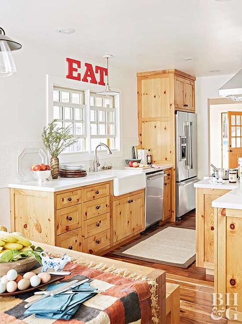 elizabeth morgan albert home renovation (kitchen with knotty pine cabinets and white countertops) for better homes and gardens magazine Pine Cabinets Kitchen, Knotty Pine Kitchen Cabinets, Home Renovation Kitchen, Knotty Pine Cabinets, Knotty Pine Kitchen, Pine Kitchen Cabinets, Better Homes And Gardens Magazine, Renovation Kitchen, Pine Cabinets