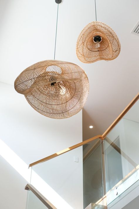 These gorgeous Rattan Pendants from Bisque Traders were the perfect piece for this void at our Woodlands Residence. Not only do they compliment the handrail, but the open weave meant we could cluster 2 pendants without jeopardising the open feel. Interior Styling: Using Rattan Pendants in Hallway - Prince Design Australia #princedesignau Hanging Lamps Staircase, Stair Void Pendant Lighting, Rattan Pendant Light Hallway, Void Pendant Lighting, Void Lighting Ideas, Void Lighting Pendants, Hanging Light Staircase, Pendant Light Over Stairs, Stairwell Pendant Light