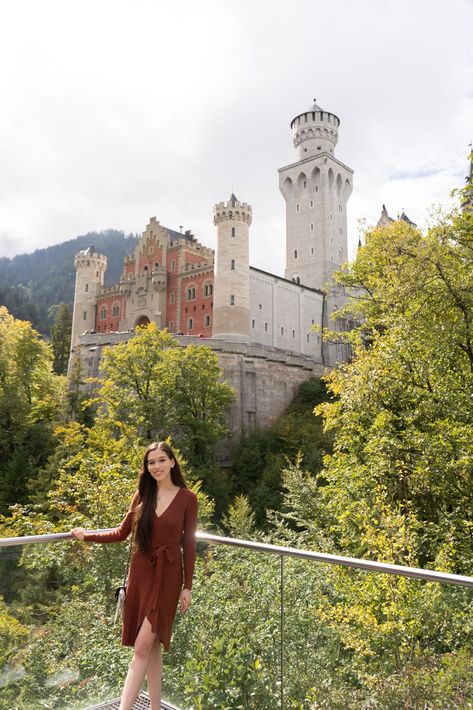 Looking for the best view of Neuschwanstein Castle? Most just think of Marienbrucke (the bridge overlooking Schloss Neuschwanstein), but there's actually several amazing hidden viewpoints around the castle. This castle inspired Disney World's Cinderella Castle, as well as Disneyland's Sleeping Beauty Castle. Find out how you can visit by clicking below! Eva is wearing a rust orange brown Abercrombie and Fitch wrap sweater dress @eva_darling Castle In Germany, Linderhof Palace, Blogger Outfit Inspiration, Frat Parties, Wrap Sweater Dress, Best Instagram Photos, Travel Germany, Germany Castles, Sleeping Beauty Castle