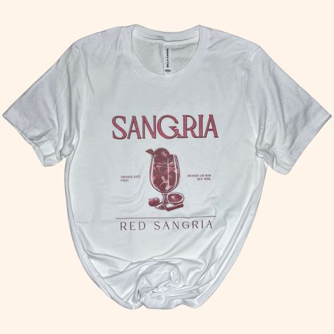 Shopsassyqueen.com for more SALES and DESIGNS. Sweatshirts available on shopsassyqueen.com**************************Infuse your wardrobe with the vibrant spirit of summer with our Red Sangria Tee, swirling in shades of red and pink for a look that’s as intoxicating as it is stylish. 🍷🌺 #IntoxicatingStyle #SummerSpirit #RedInfusionCelebrate the richness of life with the Red Sangria Tee, where every sip of style is filled with fruity undertones and sun-kissed hues. This tee features a playful mix of wine and fruit elements, all swirling together in a captivating dance of reddish-pink shades that echo the joy of a glass of sangria on a warm afternoon. Crafted from soft, lasting fabric, it promises both comfort and style that endures, making it perfect for any laid-back occasion or festive g Sangria Party, Rum And Orange Juice, Wine And Fruit, Sangria Mix, Picnic Fashion, Sassy Tee, Wine Shirt, Red Sangria, Summer Brunch